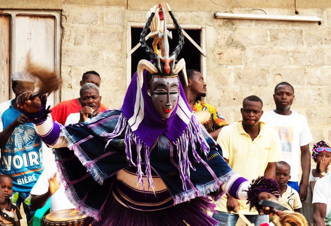 Traditional Goli masked dance is one of the most mesmerizing traditions encountered on Ivory Coast cultural tours